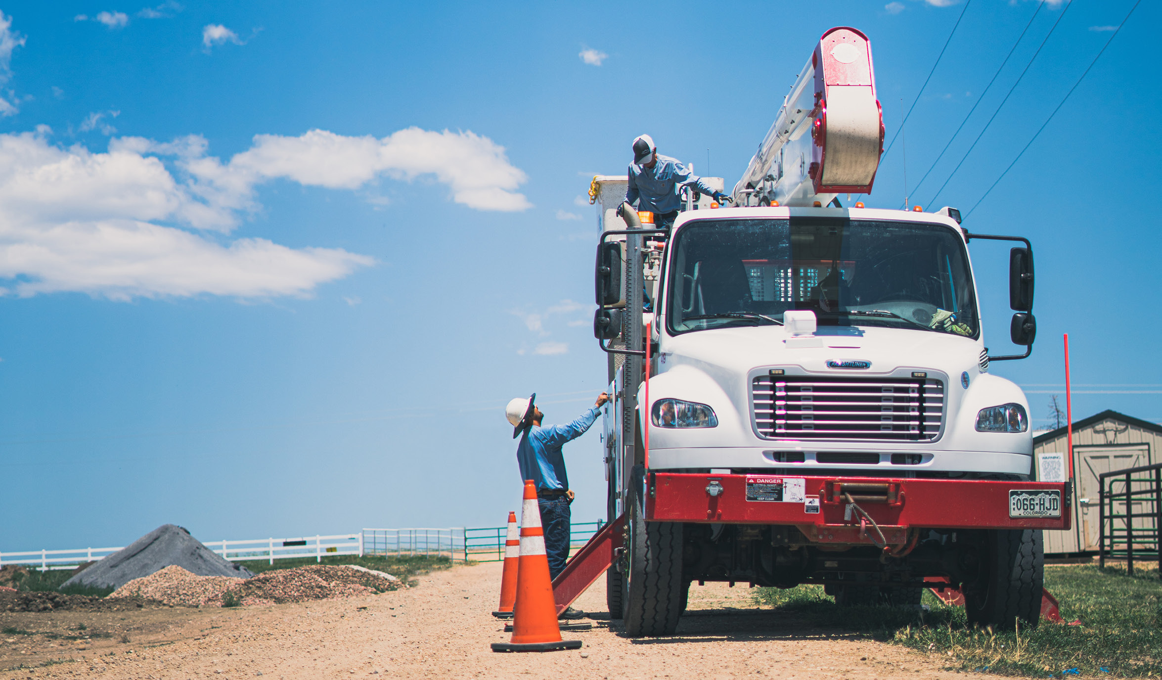 line workers at truck