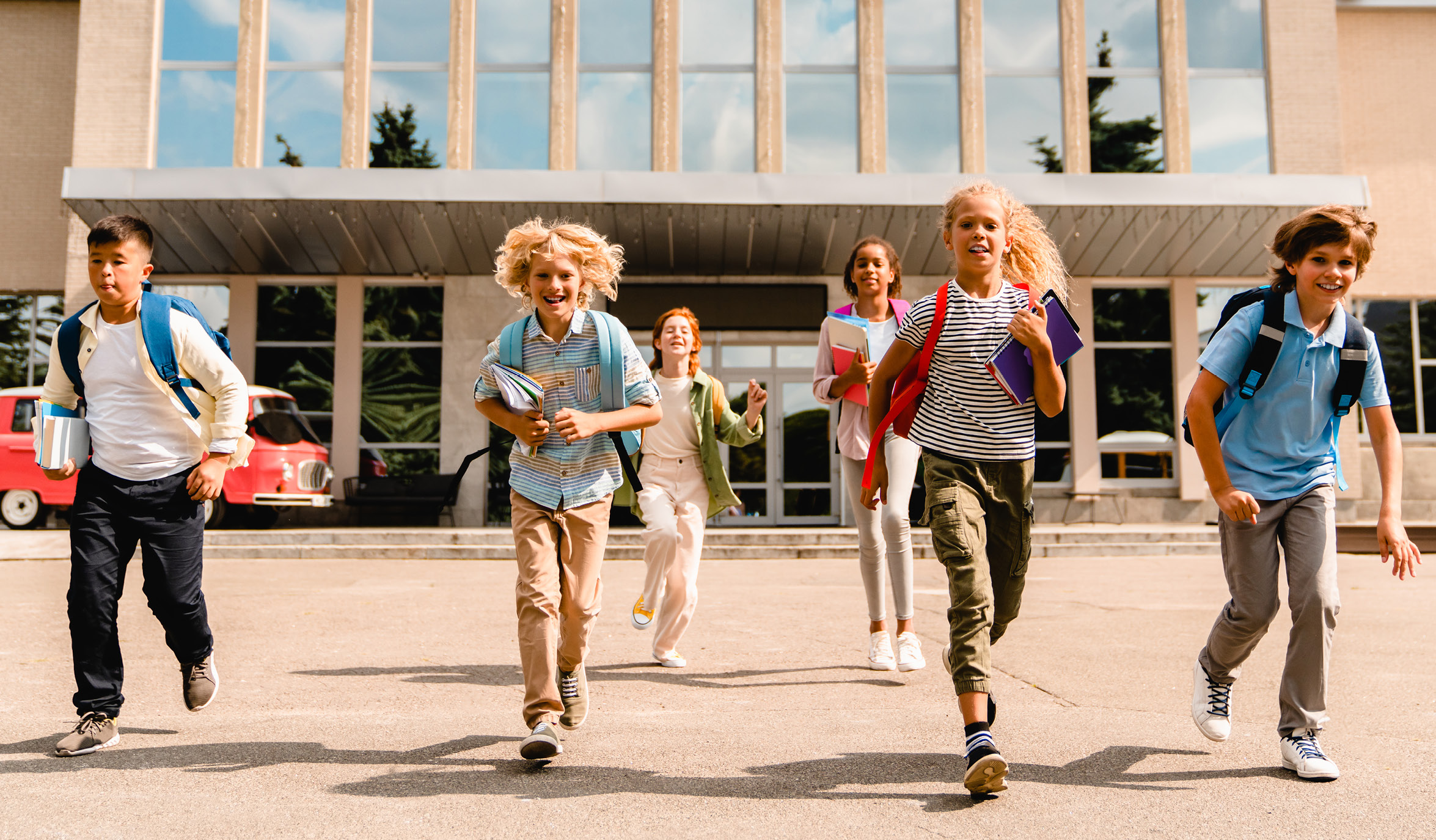 kids running outside school