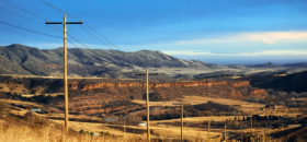 Plains hills with a bluff and powerlines