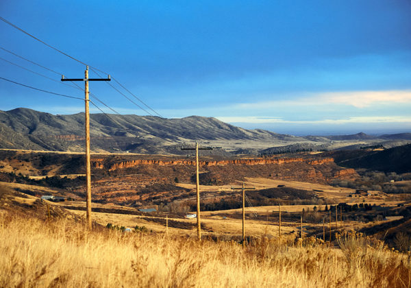 Plains hills with a bluff and powerlines