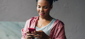 woman looking at phone