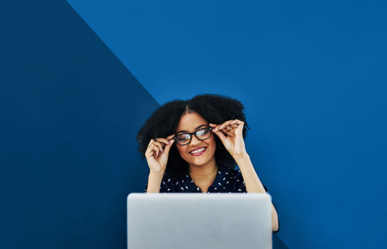 happy woman on laptop