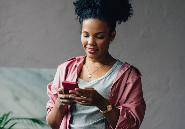 woman looking at phone