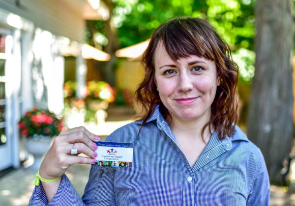 woman holding card