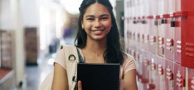 student by lockers