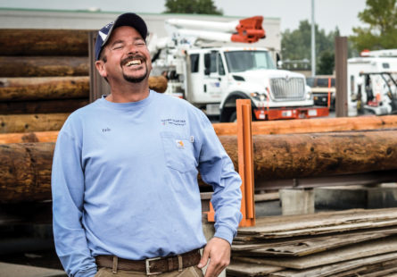 employee smiling outside